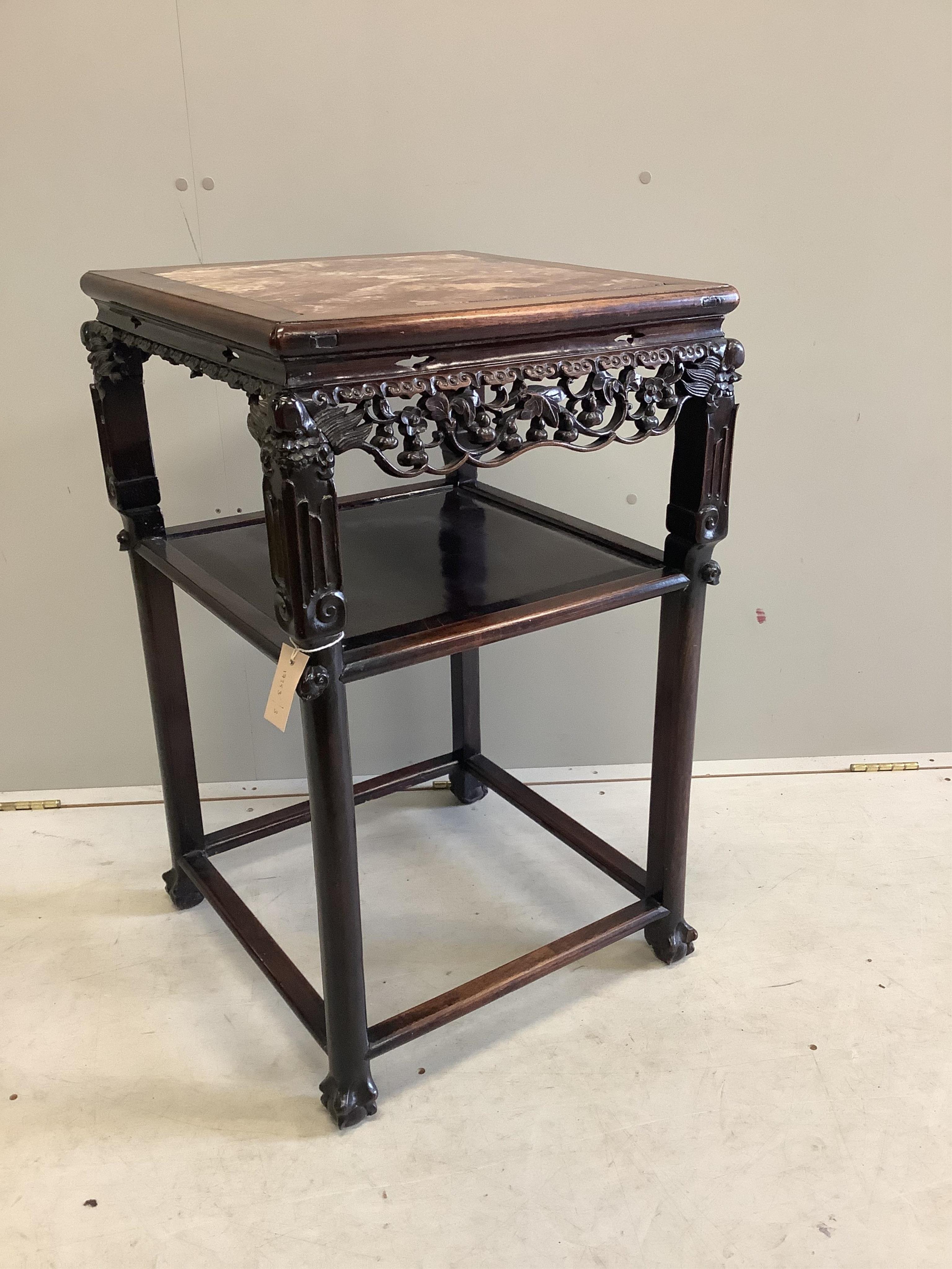 A Chinese hardwood two tier vase stand with inset marble top, width 49cm, depth 48cm, height 82cm. Condition - fair